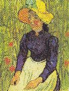 Young Peasant Woman with straw hat sitting in front of a wheat field
